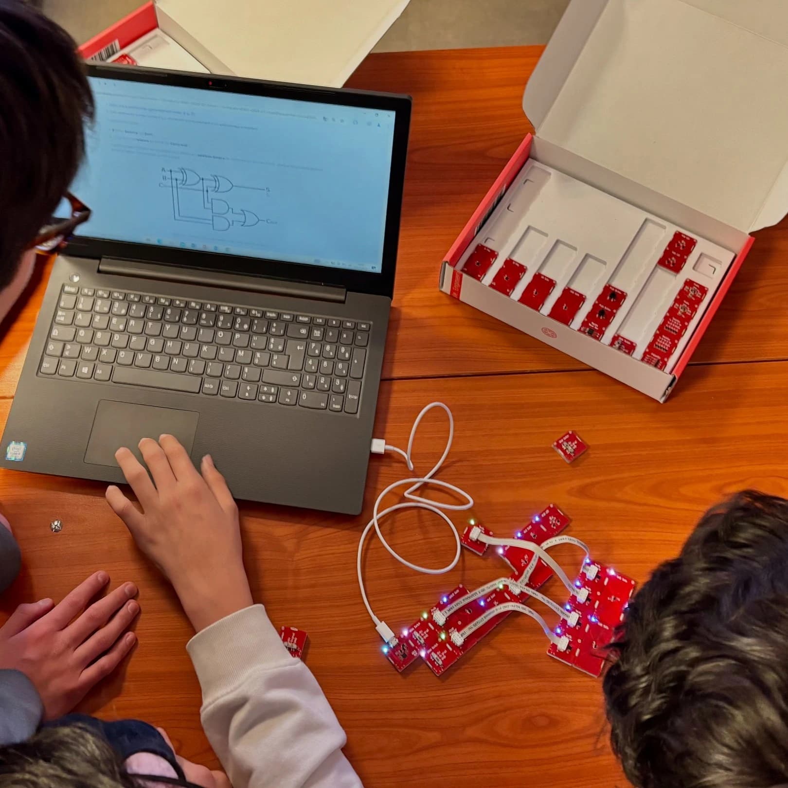 Students building circuits with PomeLabs Connect